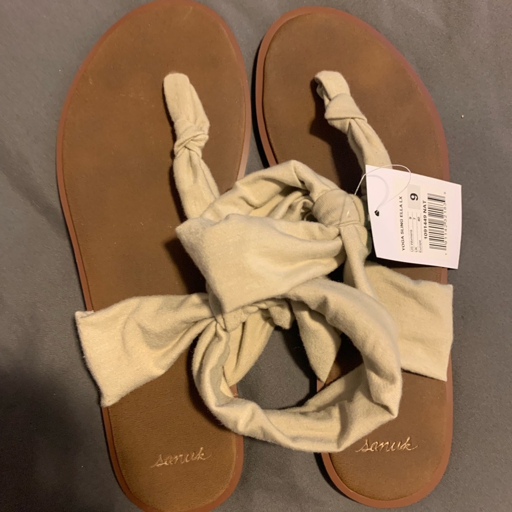 Sanuk slingback sandals.